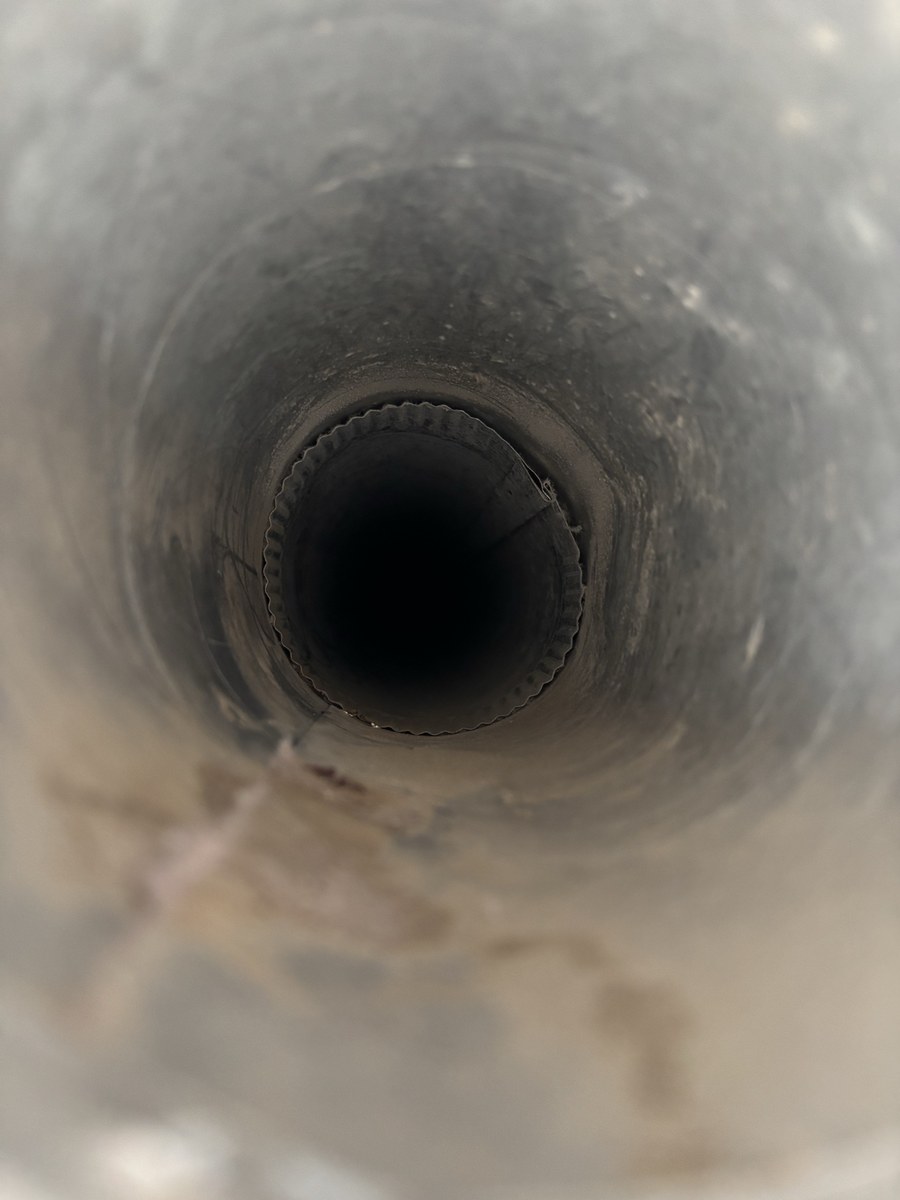 The same dryer vent pipe after cleaning, clear