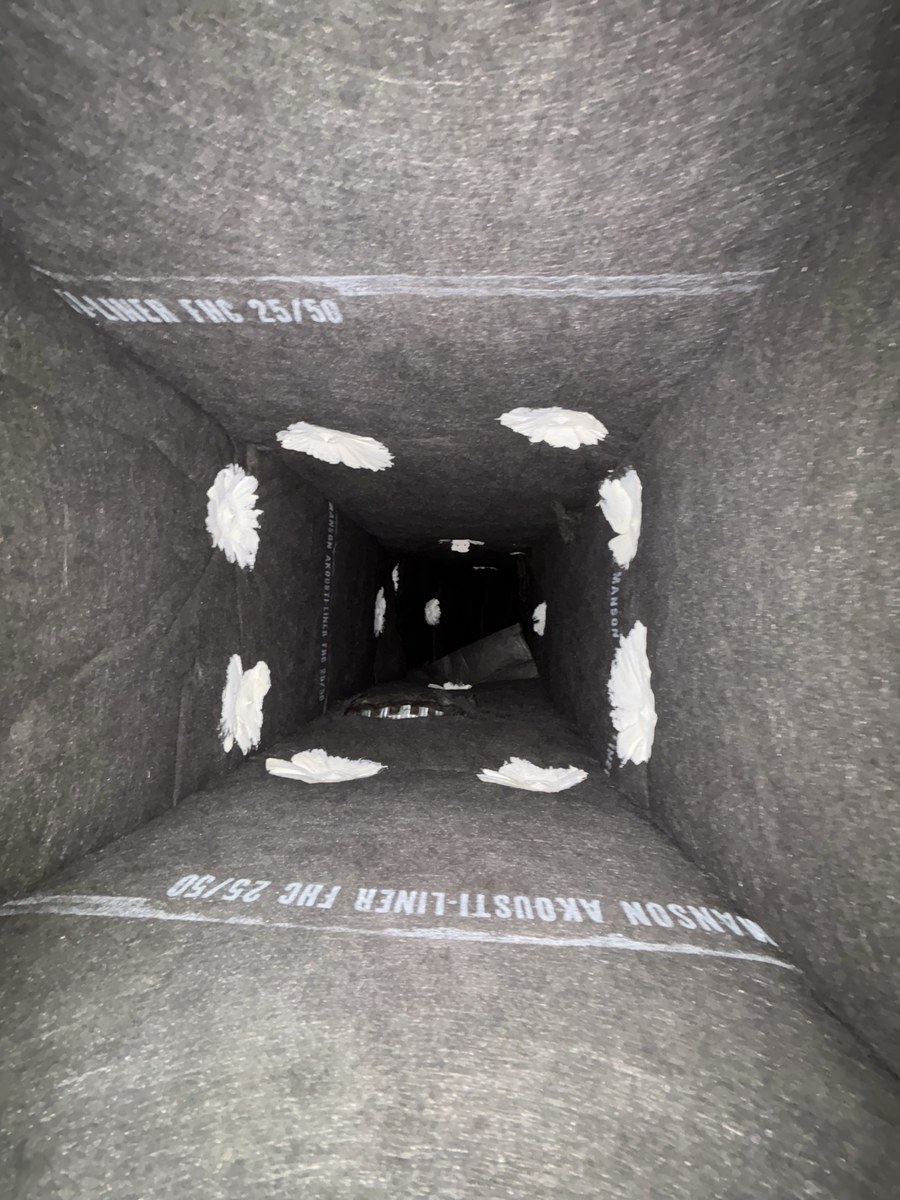The same duct run after cleaning, clean liner