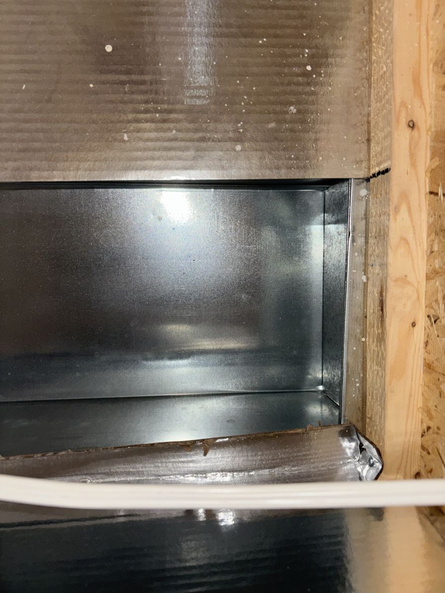 The same duct after cleaning, clean metal